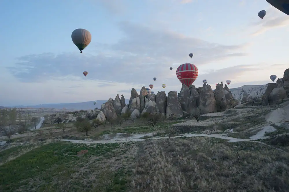 No better way to see the chimney rock formations in Cappadocia than by hot air balloon in the morning.