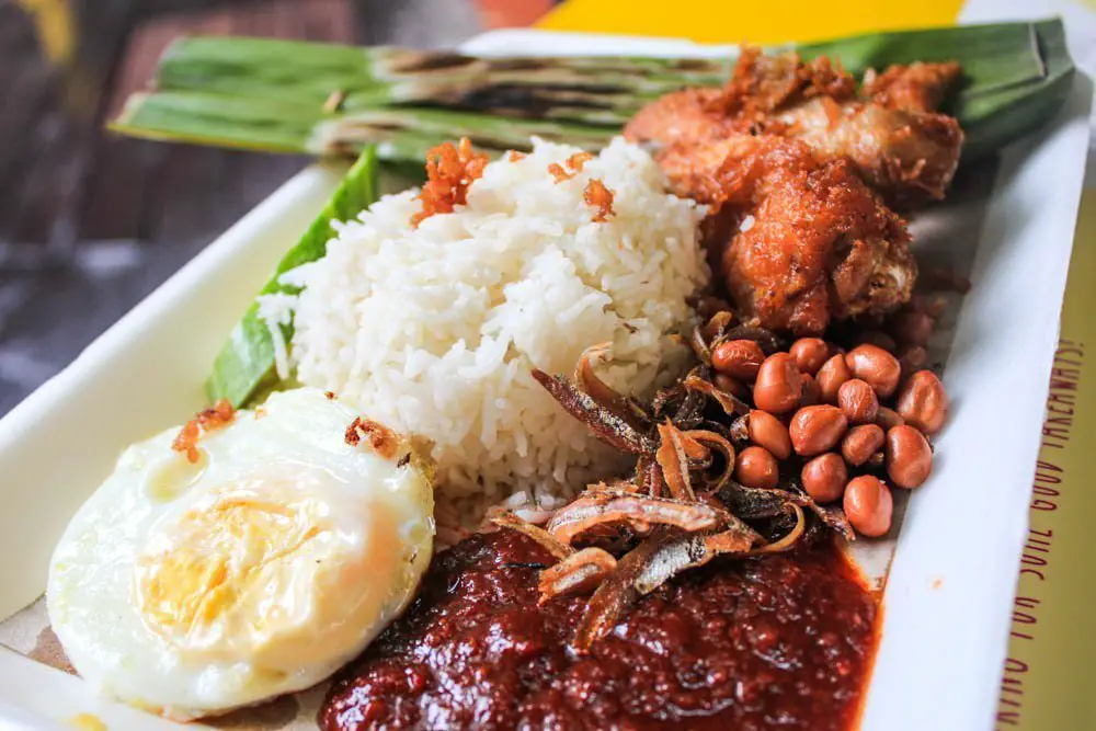 Nasi Lemak: A typical Malay dish that was largely a breakfast dish but recently made into lunch and dinner as well. It's typically wrapped in a banana leaf, and served with chicken, egg, cocunut rice, and most importantly a good sambal sauce. I was absolutely obsessed with this dish and ate it on a daily basis when I went to Malaysia.