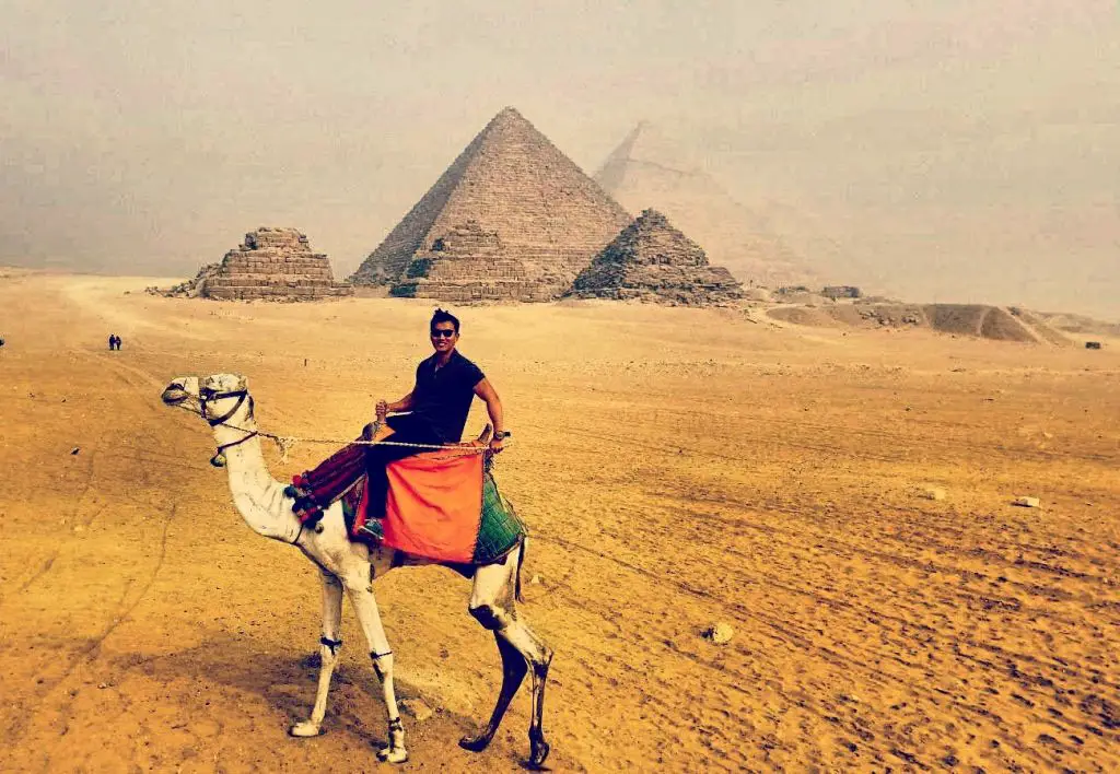 camel ride great pyramid of giza cairo egypt desert