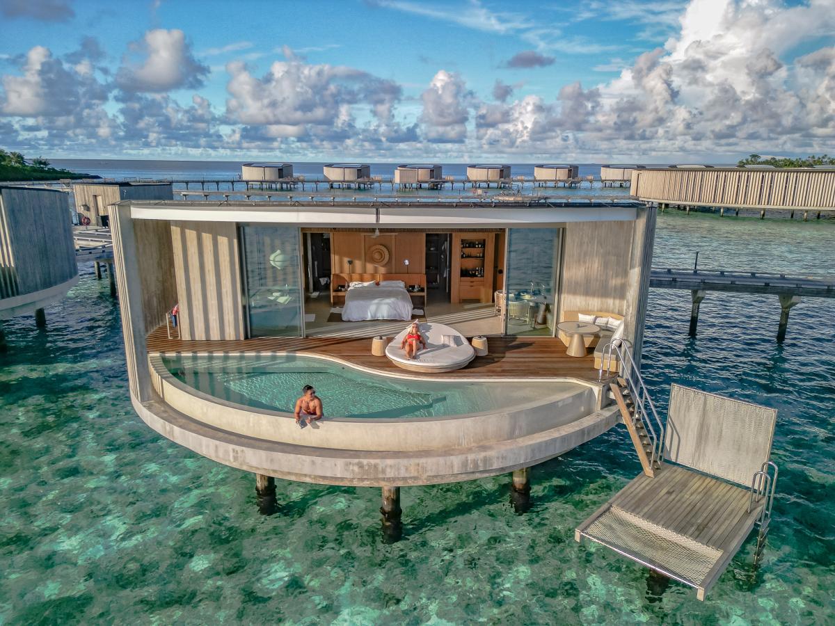 Ritz Carlton maldives overwater villa room drone